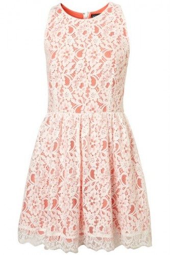 Love that this hyperfeminine lace dress has a racerback